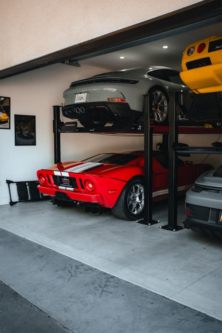 Collector cars arranged in a private home garage