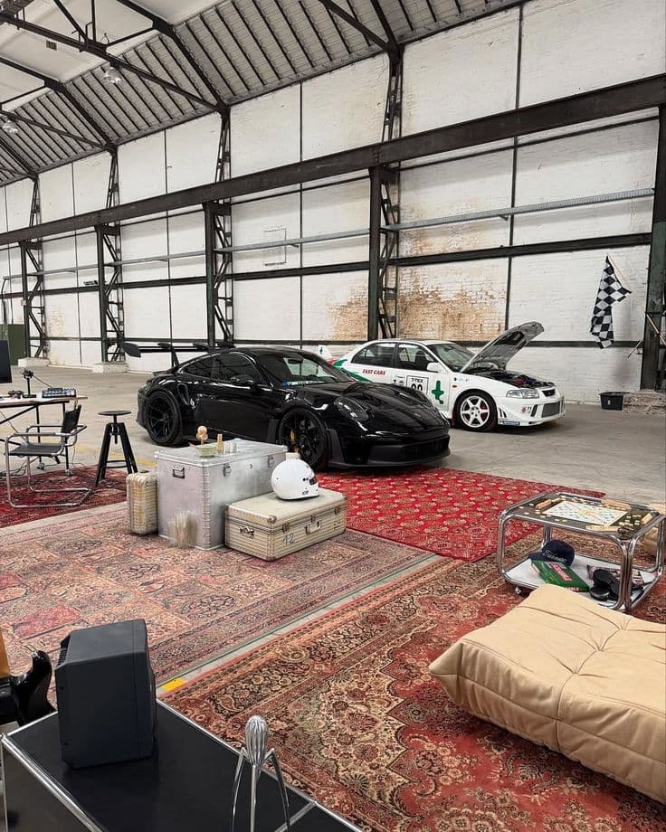 Collector-car culture inside an industrial gathering space