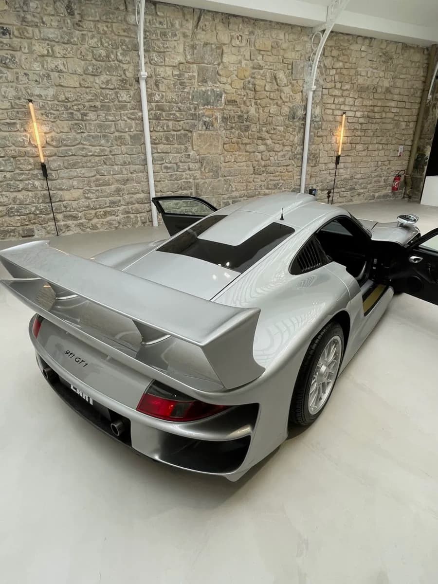 Silver Porsche 911 GT1 photographed from the rear